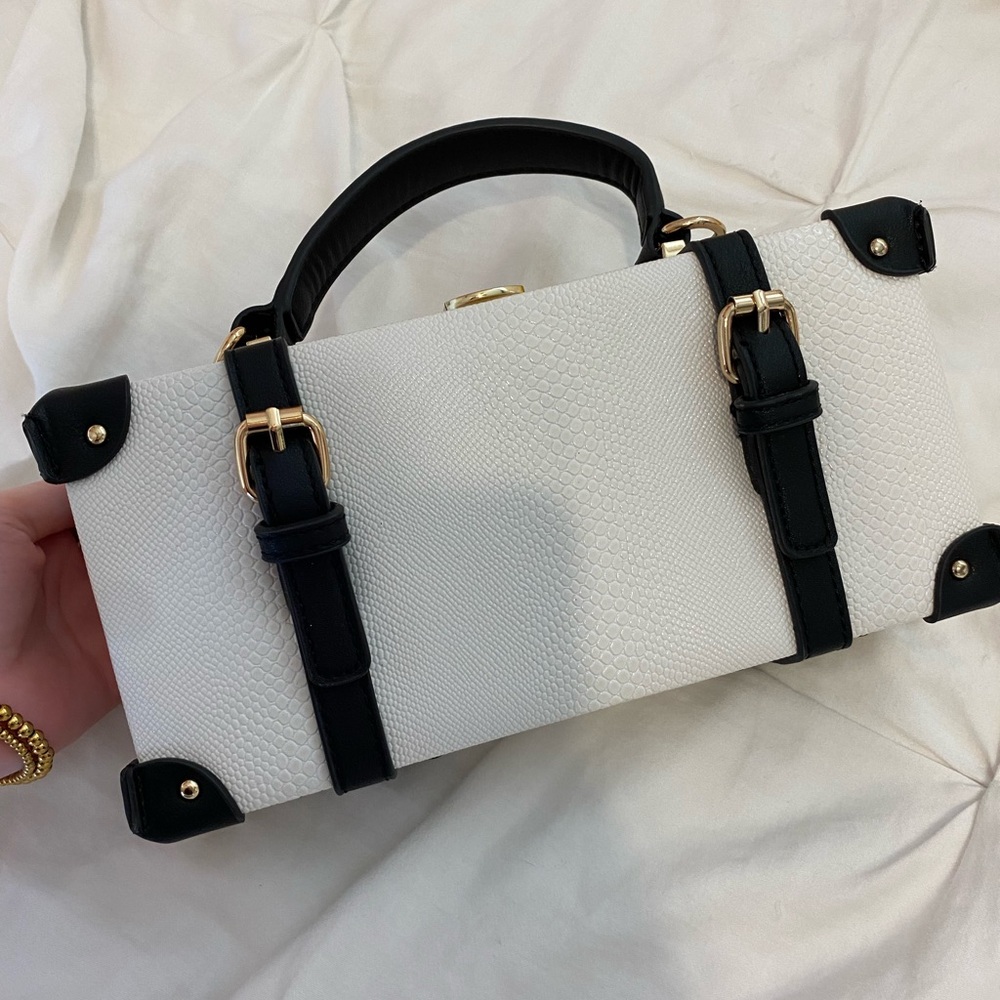 White & Black clutch bag.